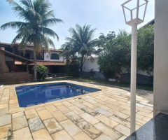 Casa por temporada cm Piscina e churrasqueira