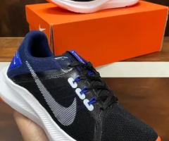 Tênis Nike masculino quest 4